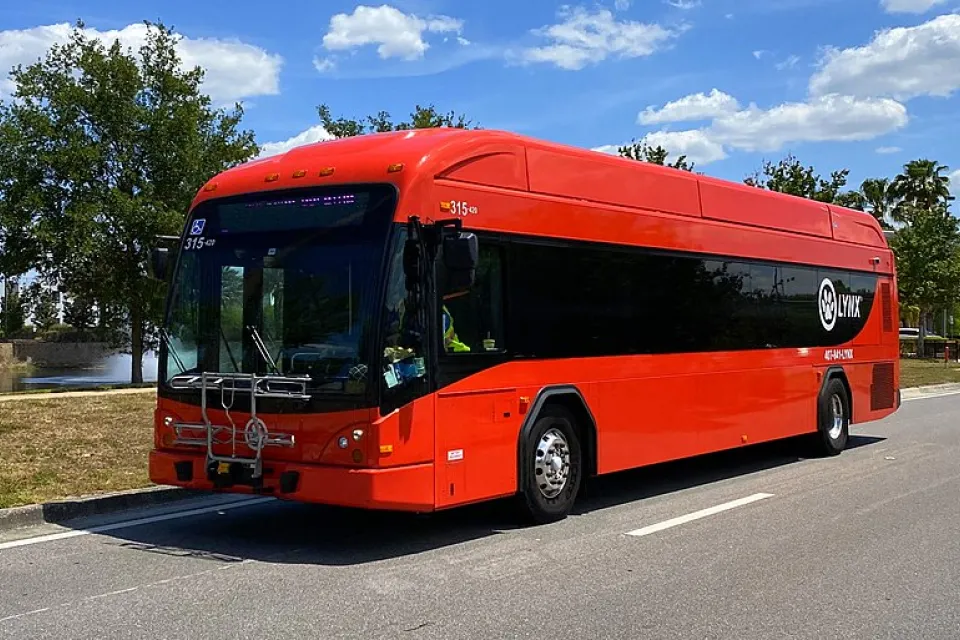 Red Lynx bus in operation on Vineland Avenue in Orlando, Florida in April 2021.